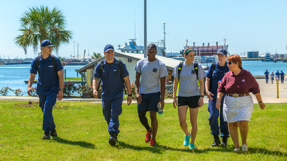 A group of students walking together on Galveston campus