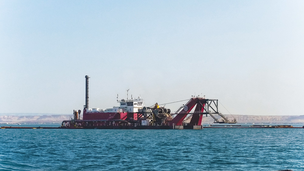 Large dredge in water