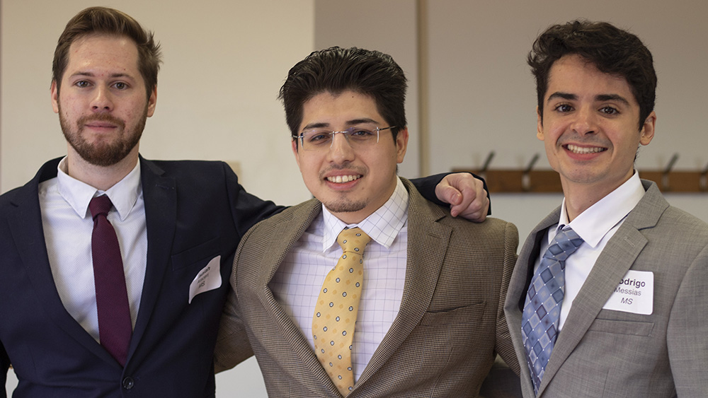 three smiling masters student winners of the Harold Vance Department of Petroleum Engineering student paper contest