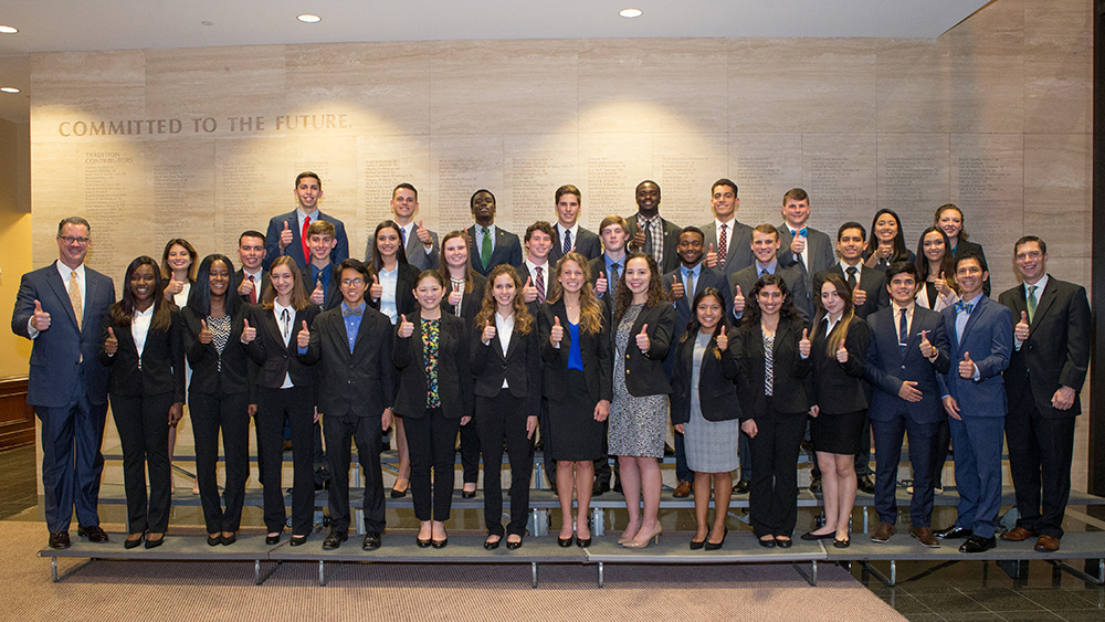 A cohort of Zachry Leadership Program students pose for a group photo